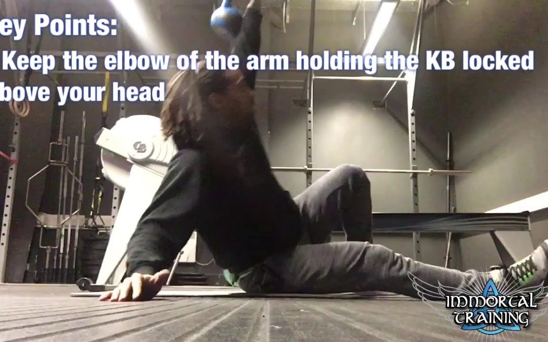 Single Arm Overhead KB Sit-Up